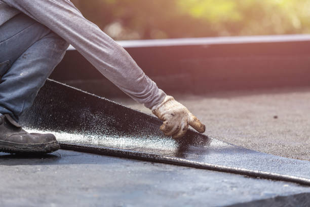 Professional Waterproofing technician working in Castleton, VA